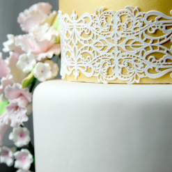 Image of cake decorated with cake lace.