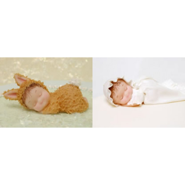 Image of decorated babies made from the Sleeping Baby & Pillow Mold by Karen Davies.