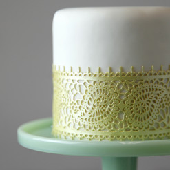 Image of cake decorated with cake lace.